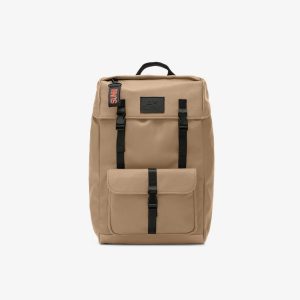 backpack man sand